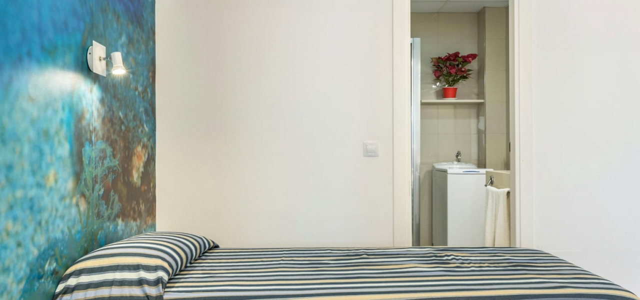 Cama-Baño Vivienda Vacacional 50 Apartamentos Juan Pérez en Playa de las Canteras